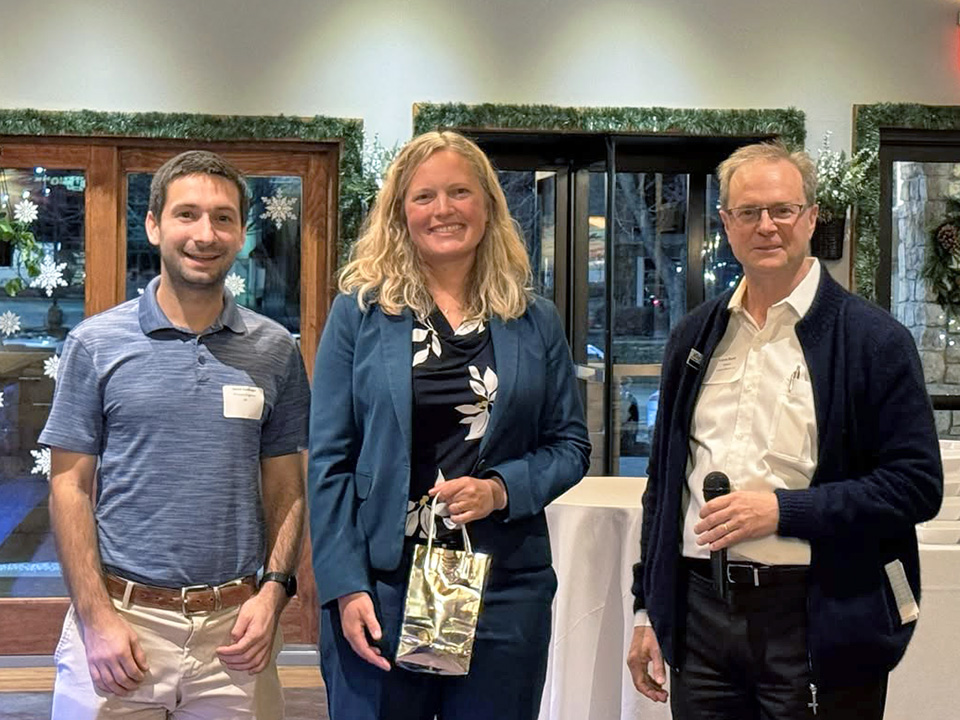 Photo from the Jan 15 2026 joint meeting of the Chicago ACS and Chicago AIChE, showing the speaker flanks by the AIChE Chair and Program Chair