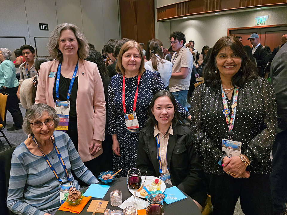 Photo from the Atlanta meeting: Attendees at the ice cream reception hosted by the International Activities Committee (IAC) including (top row, left to right) Past ACS President Mary Carroll, Daniela Andrei, and Anita Mehta.