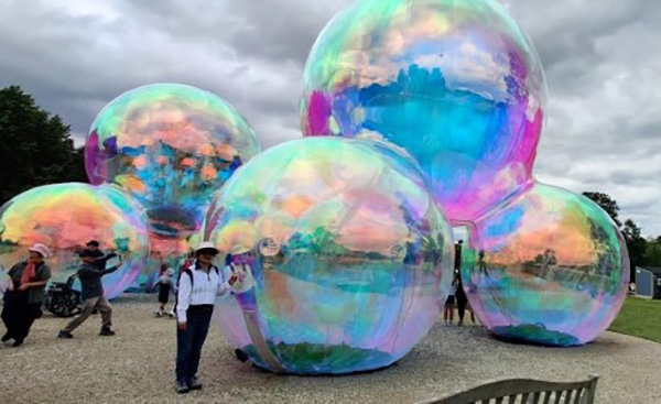 Inflatable iridescent sphere sculptures at the Chicago Botanic Garden's art installation 